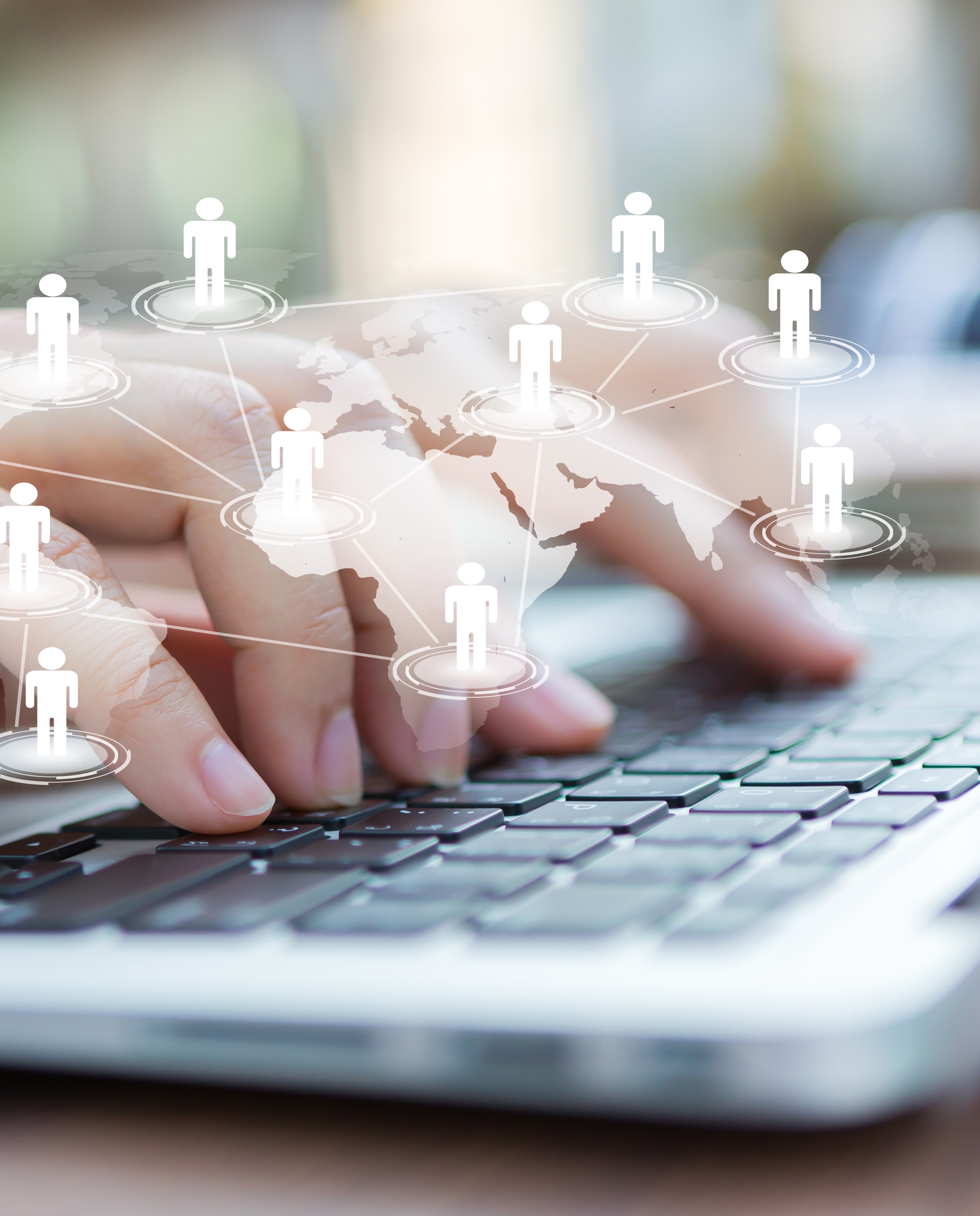 Closeup of business woman hand typing on laptop keyboard